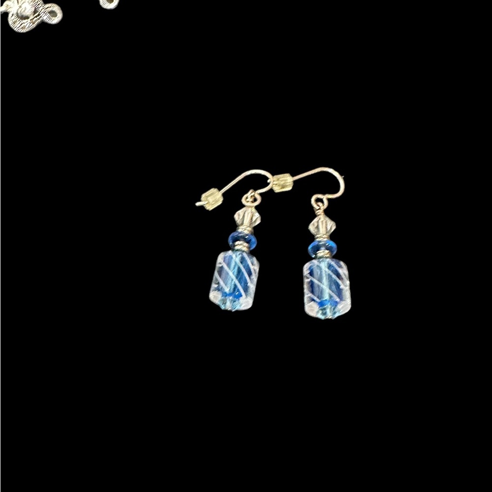 Beautiful glass drop earrings with blue interior glass. Stunning!